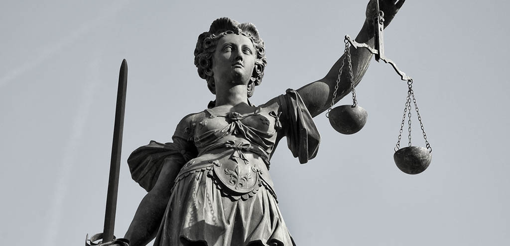 Justitia Statue als Zeichen der Gerechtigkeit